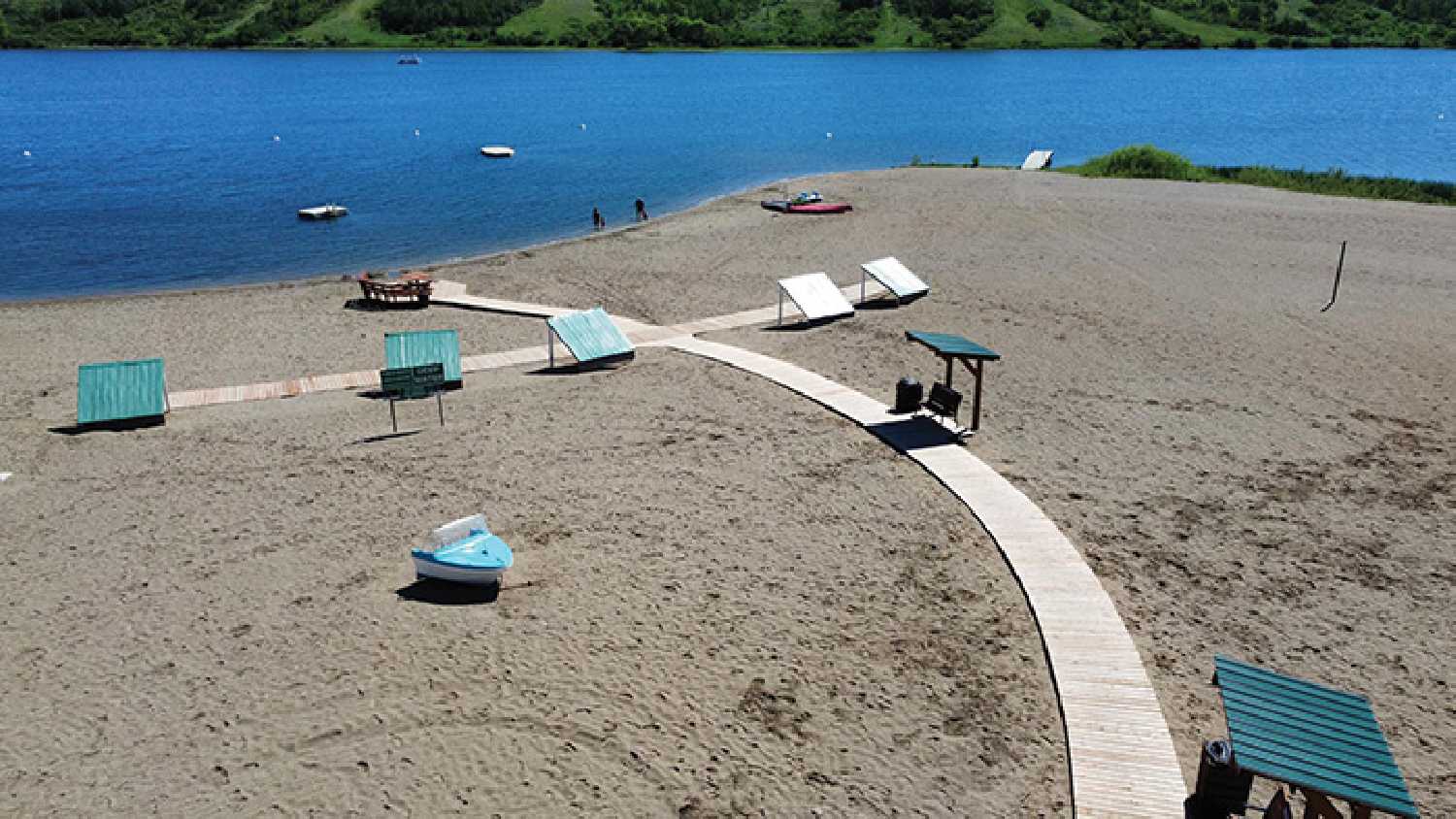 Moosomin Regional Park lake and boardwalk.